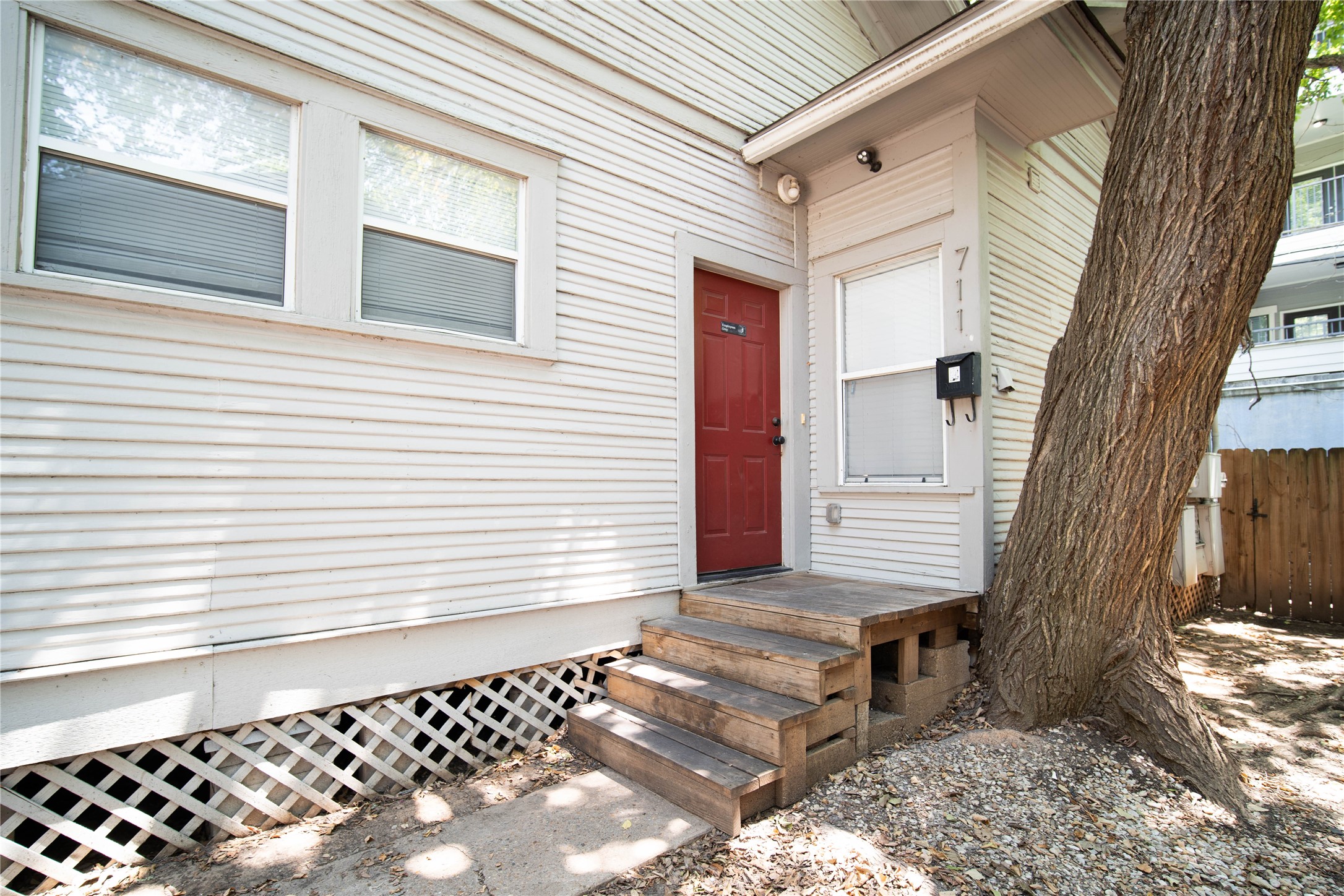 711 Graham Place, Unit B Austin, TX 78705 - Photo 9 of 13 a view of a house with a door