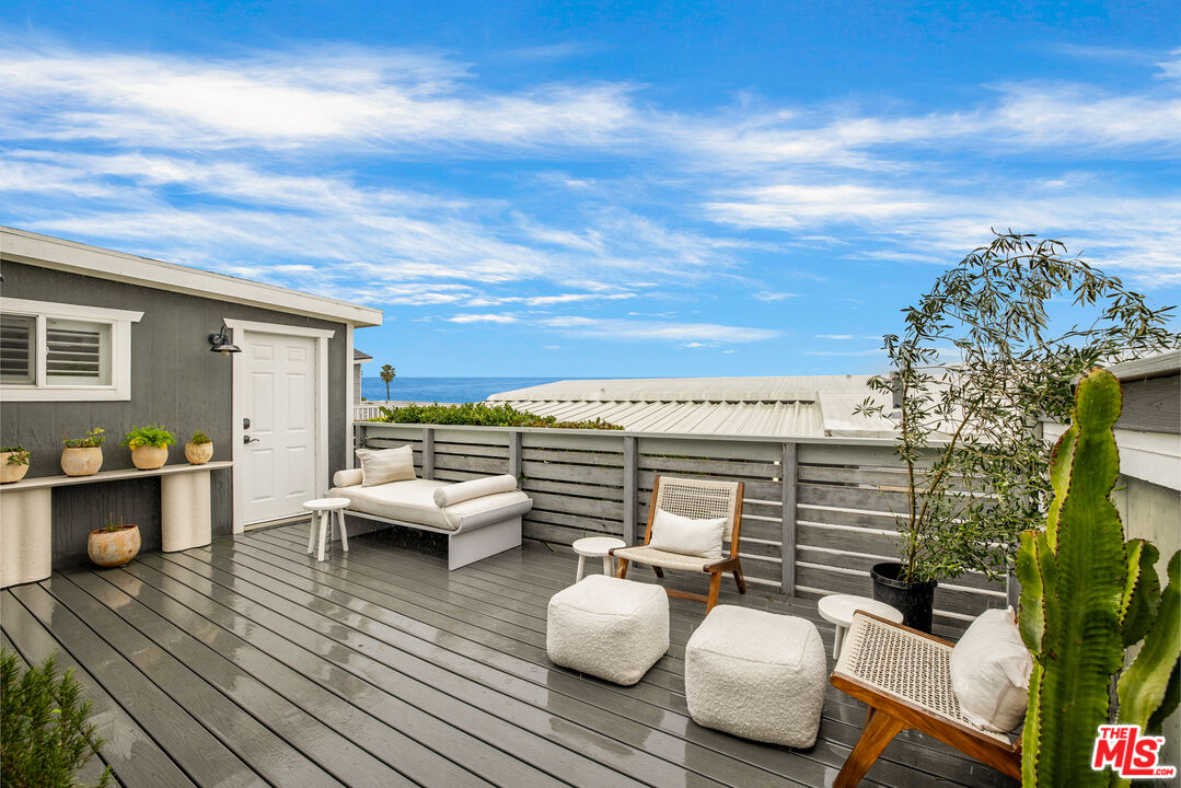 29500 Heathercliff Road, Unit 235 Malibu, CA 90265 - Photo 28 of 32 a view of roof deck with patio