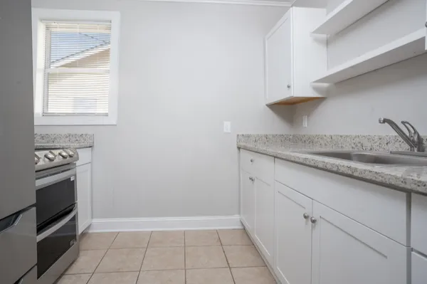 a bathroom with a sink toilet and bathtub