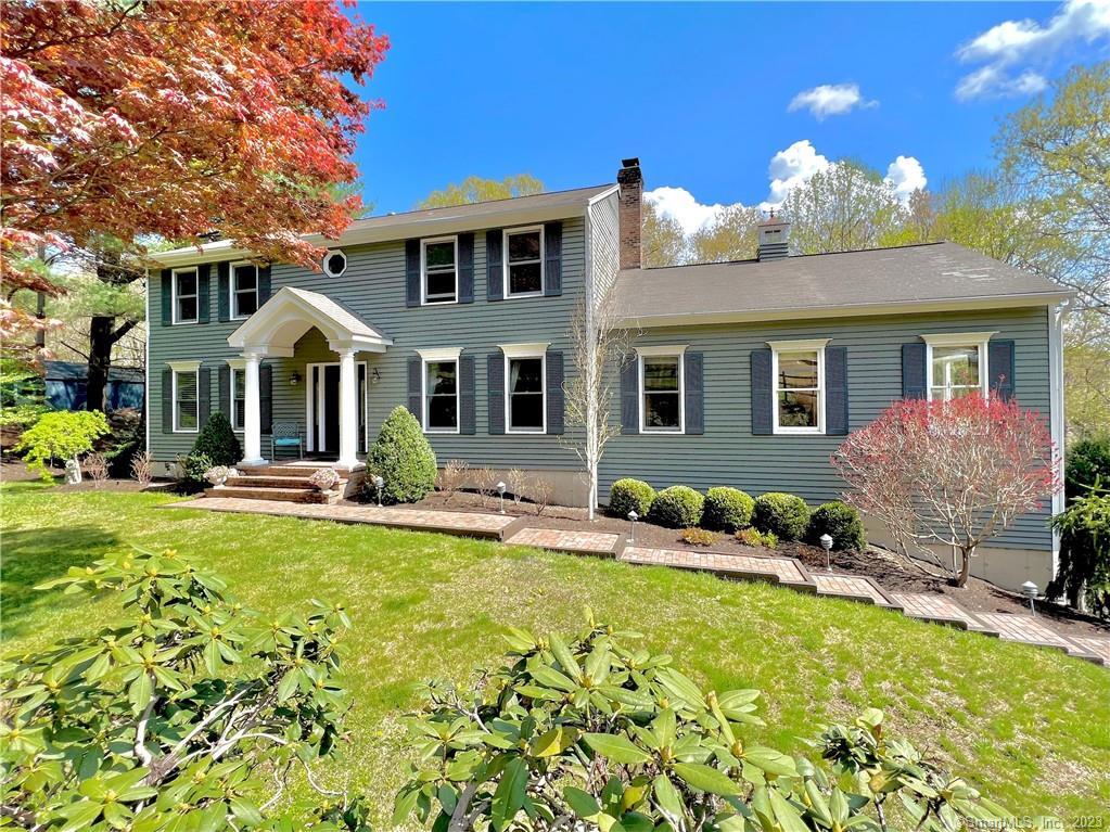 a front view of a house with patio