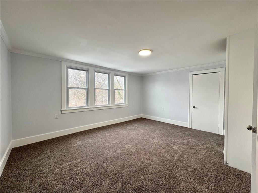 1416 Ridge Avenue Coraopolis, PA 15108 - Photo 12 of 24 an empty room with windows and closet