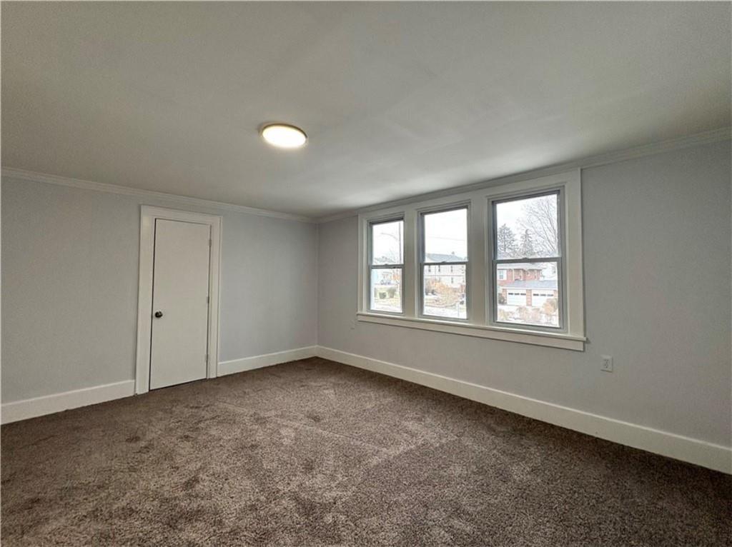 1416 Ridge Avenue Coraopolis, PA 15108 - Photo 13 of 24 an empty room with windows and closet