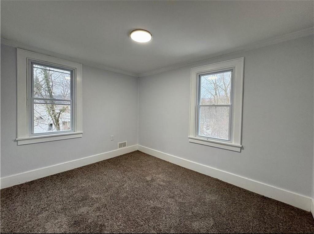 1416 Ridge Avenue Coraopolis, PA 15108 - Photo 16 of 24 an empty room with windows