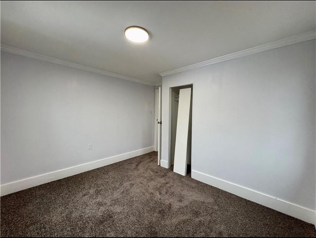 1416 Ridge Avenue Coraopolis, PA 15108 - Photo 17 of 24 an empty room with a natural light