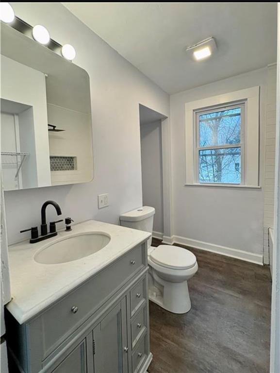 1416 Ridge Avenue Coraopolis, PA 15108 - Photo 19 of 24 a bathroom with a toilet sink and mirror