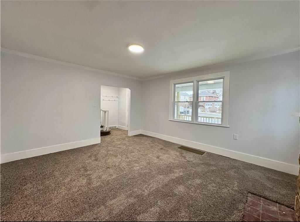 1416 Ridge Avenue Coraopolis, PA 15108 - Photo 6 of 24 an empty room with windows