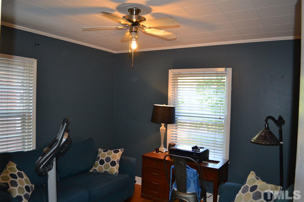 1604 Carson Street Raleigh, NC 27608 - Photo 16 of 28 a view of a workspace with furniture and a window