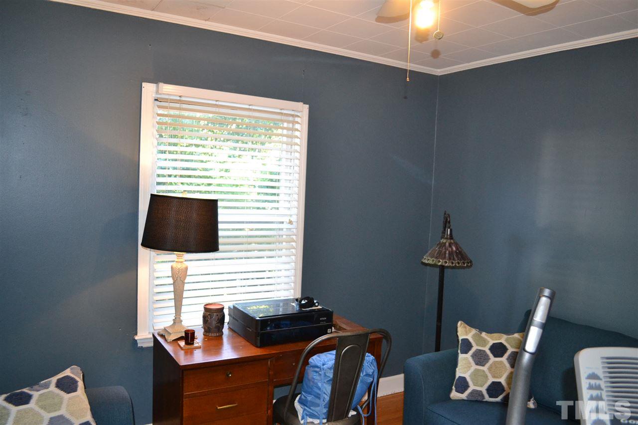 1604 Carson Street Raleigh, NC 27608 - Photo 17 of 28 a room with furniture and a window