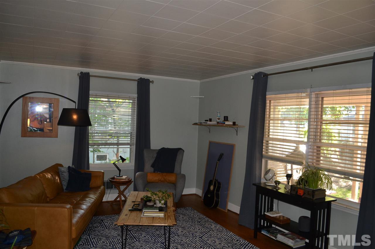 1604 Carson Street Raleigh, NC 27608 - Photo 5 of 28 a living room with furniture and a window