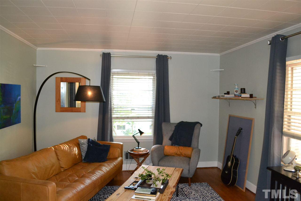 1604 Carson Street Raleigh, NC 27608 - Photo 6 of 28 a living room with furniture and a window