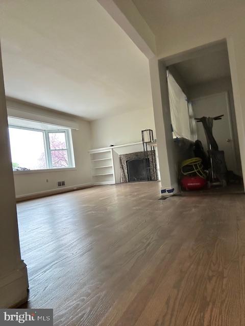 26820 Ridge Road Damascus, MD 20872 - Photo 12 of 25 a view of a livingroom with wooden floor and furniture