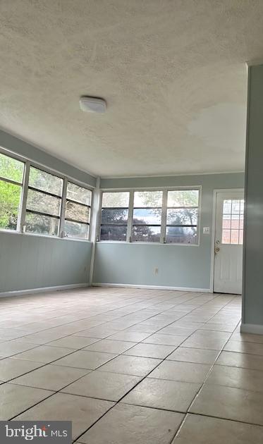 26820 Ridge Road Damascus, MD 20872 - Photo 14 of 25 a view of an empty room with a window
