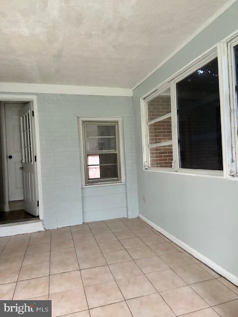 26820 Ridge Road Damascus, MD 20872 - Photo 16 of 25 a view of an empty room with a window