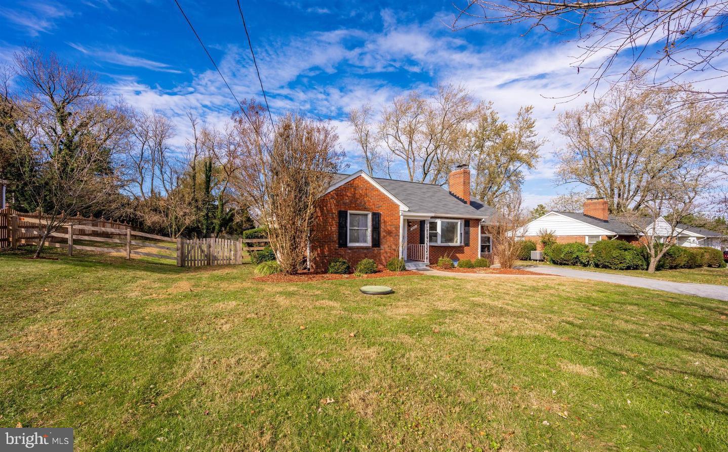 26820 Ridge Road Damascus, MD 20872 - Photo 2 of 25 a front view of a house with a yard