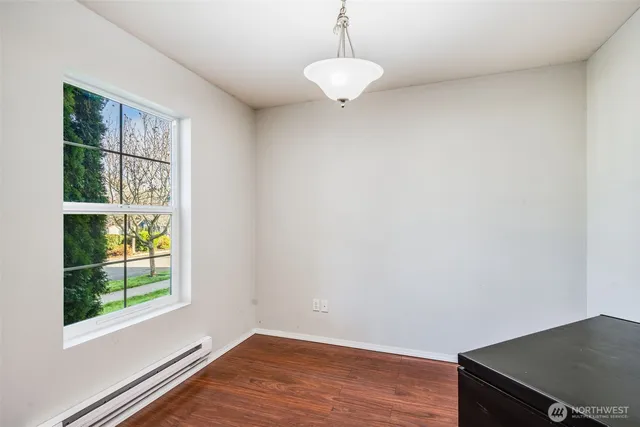 a view of entryway with wooden floor