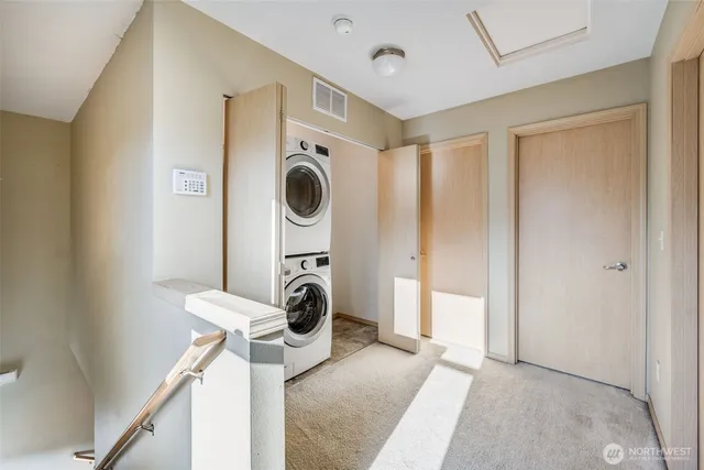 a bedroom with a bed chair and window