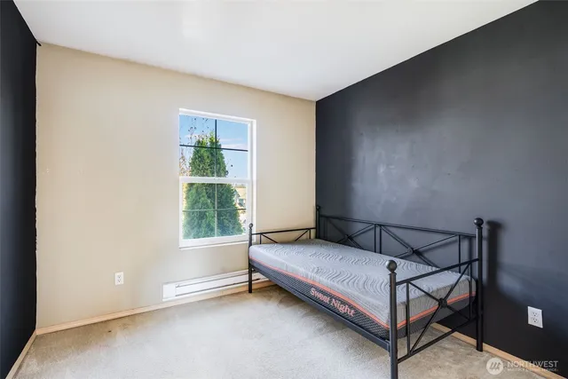 a view of a backyard with potted plants