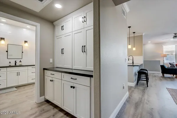 a view of a kitchen with electric appliances