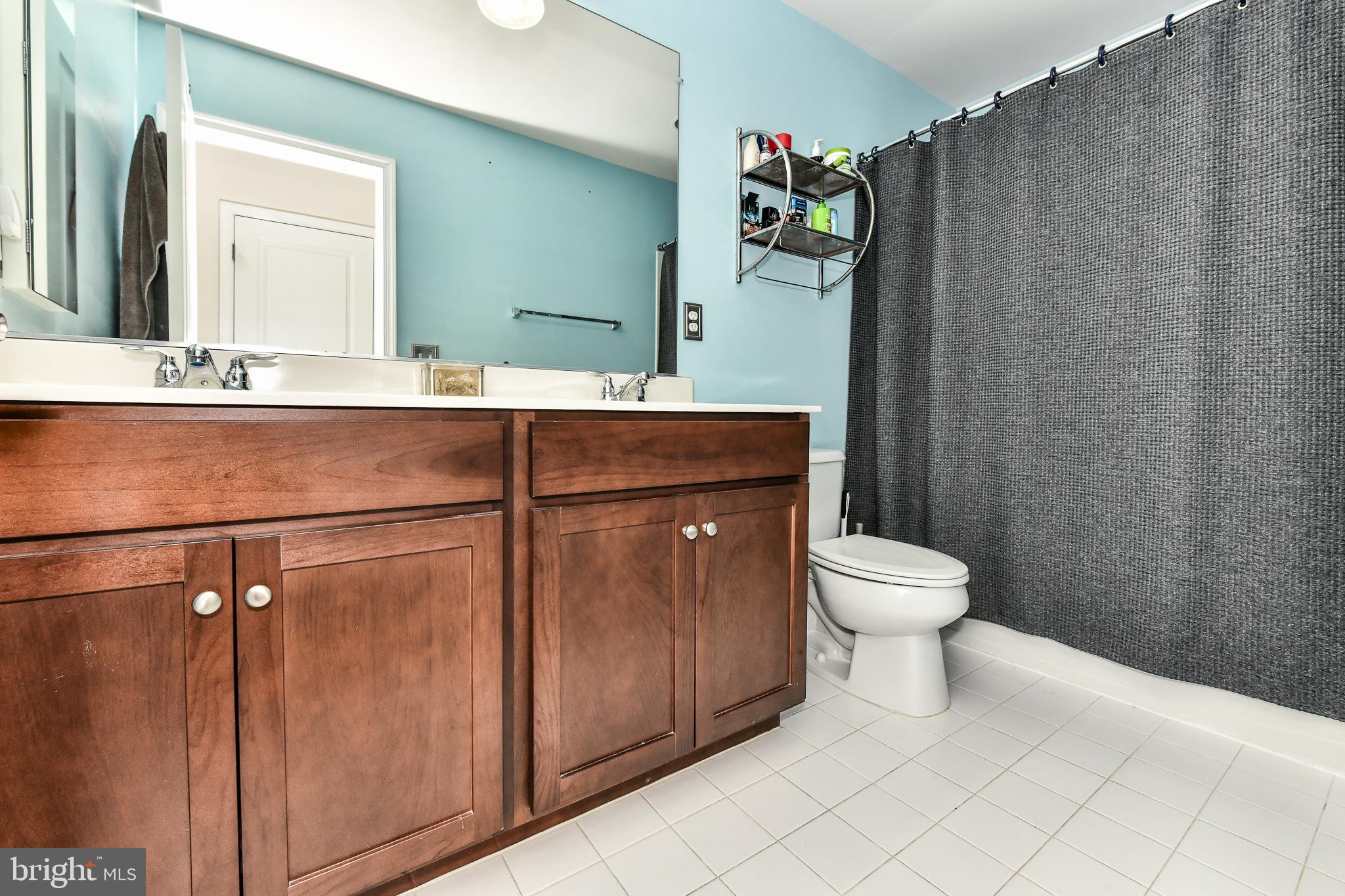 8369 Scotland Loop Manassas, VA 20109 - Photo 16 of 28 Upstairs full bath with upgraded vanity!