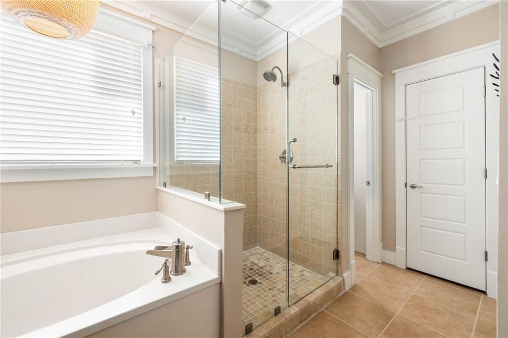 266 Atlanta Avenue Southeast Atlanta, GA 30315 - Photo 35 of 70 a bathroom with a shower and a bath tub