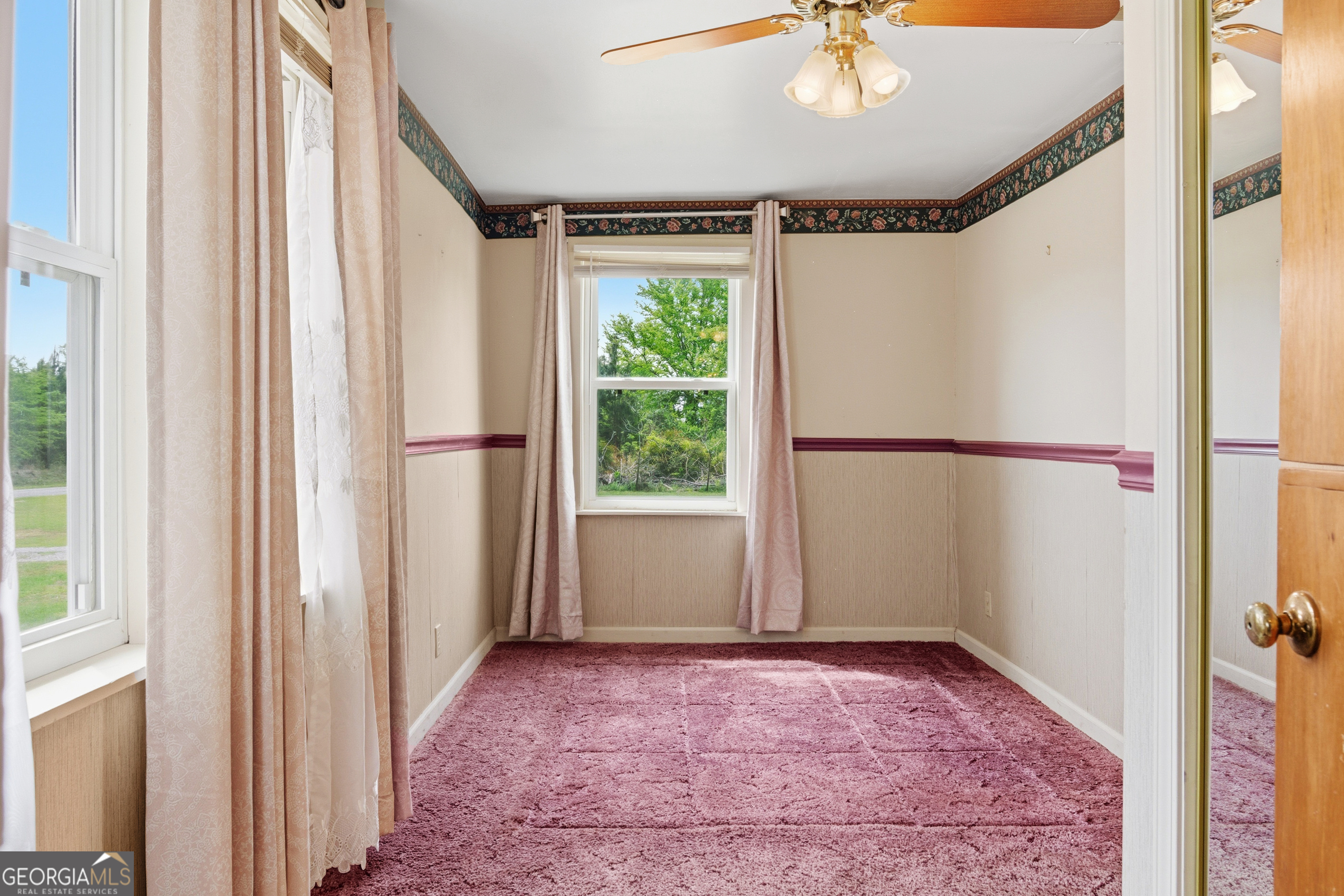 2010 Page Road Harrison, GA 31035 - Photo 23 of 59 a view of an empty room with a window