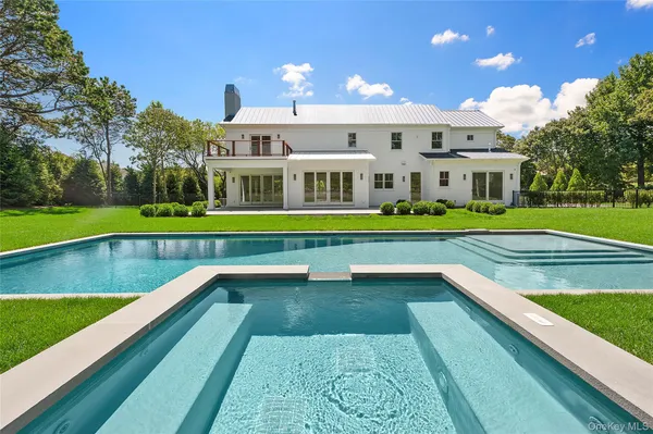 a view of a house with a swimming pool