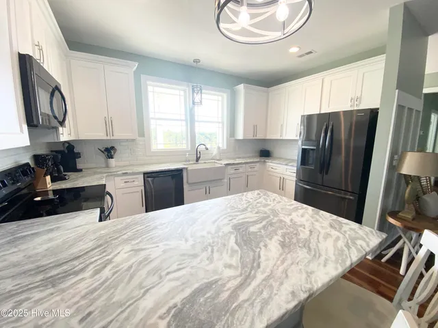 $760,000 | 128 Westbay Circle, Harkers Island, NC 28531