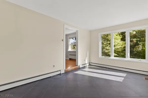 an empty room with windows