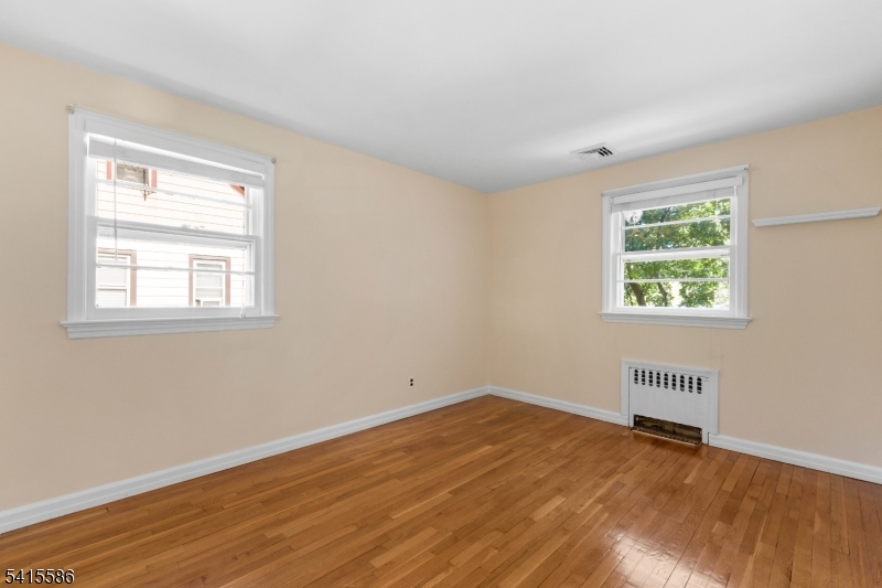 97 McCosh Road Montclair, NJ 07043 - Photo 15 of 25 a view of a room with wooden floor and windows