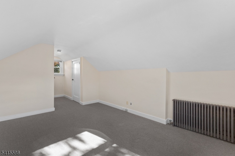 97 McCosh Road Montclair, NJ 07043 - Photo 19 of 25 an empty room with windows