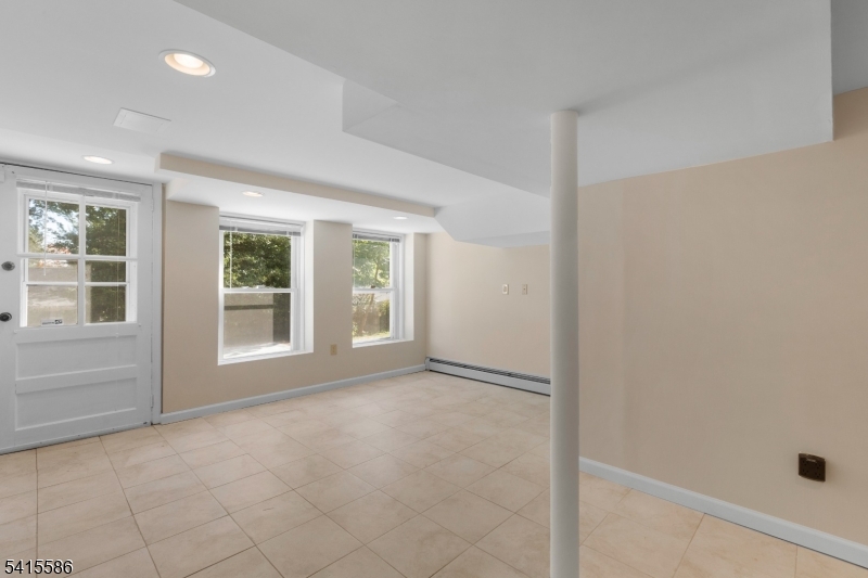 97 McCosh Road Montclair, NJ 07043 - Photo 25 of 25 an empty room with windows