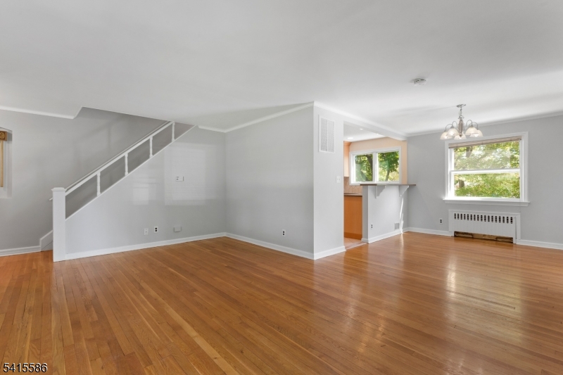 97 McCosh Road Montclair, NJ 07043 - Photo 7 of 25 an empty room with windows and entrance