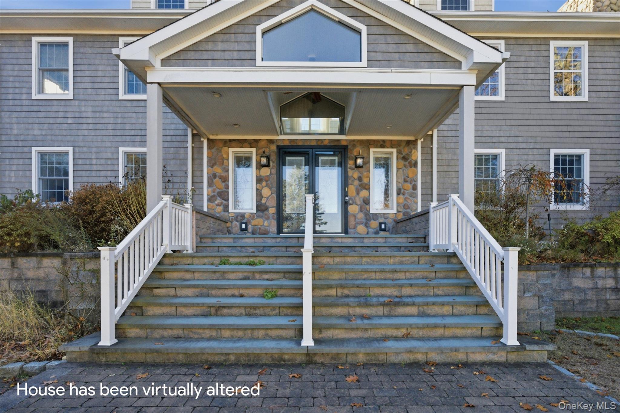 33 A Newtown Road Hampton Bays, NY 11946 - Photo 17 of 50 View of exterior entry featuring a porch, stone siding, and french doors