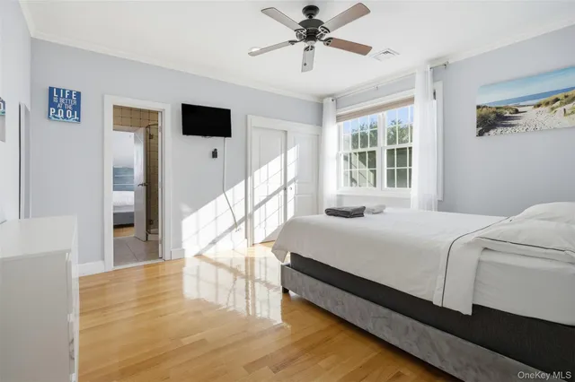 a bathroom with a tub and shower