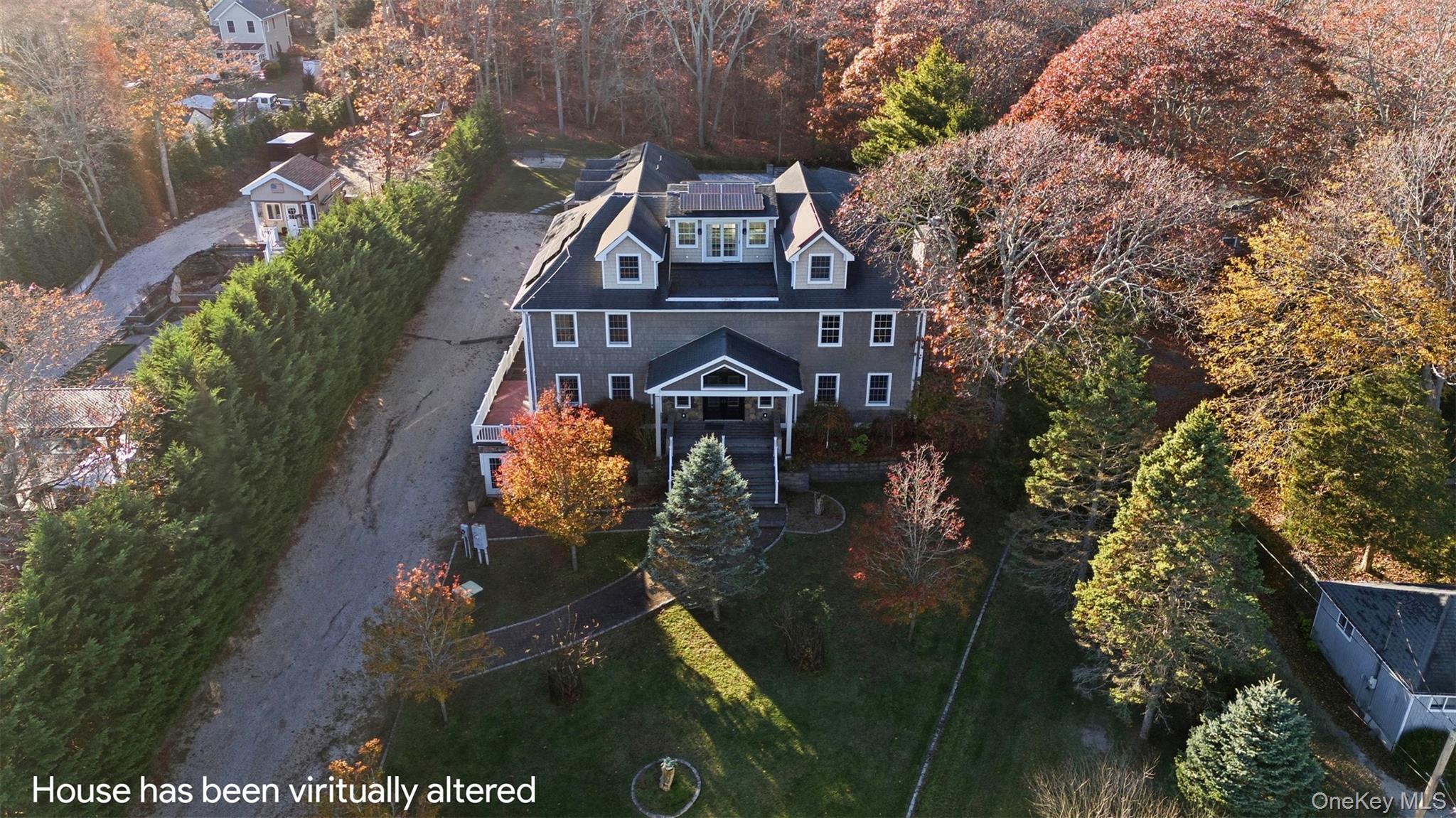 33 A Newtown Road Hampton Bays, NY 11946 - Photo 4 of 50 Bird's eye view of a tree filled landscape