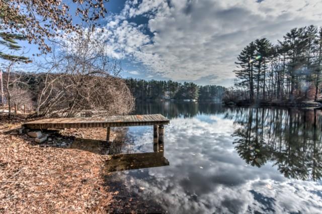 64 Old Dike Road Trumbull, CT 06611 - Photo 1 of 1 a view of a lake from a yard