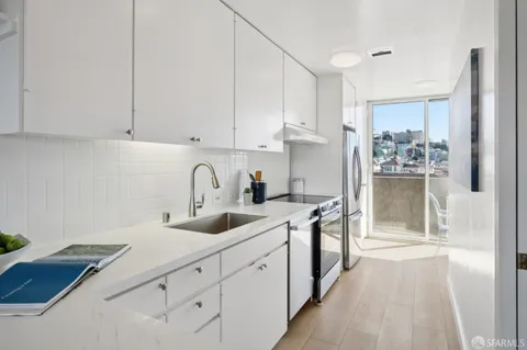 a view of a building with a potted plant