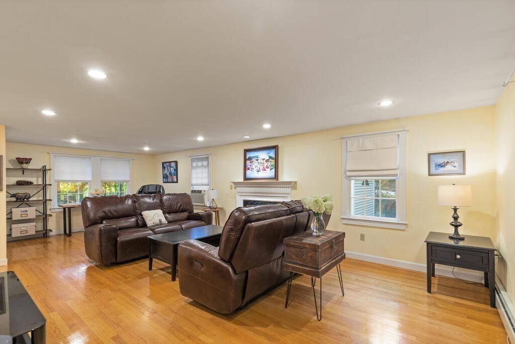 15 Labor In Vain Road Ipswich, MA 01938 - Photo 13 of 37 a living room with furniture and a wooden floor