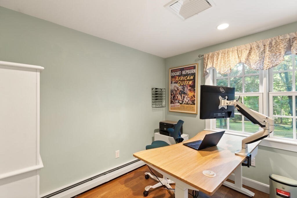 15 Labor In Vain Road Ipswich, MA 01938 - Photo 22 of 37 a view of a workspace with furniture and a window