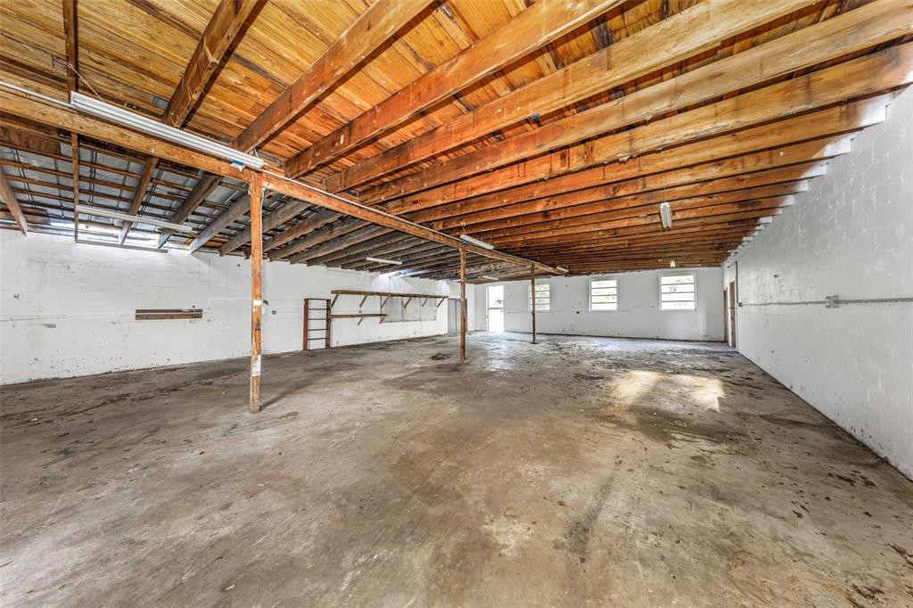 20138 Bowman Road Spring Hill, FL 34610 - Photo 11 of 40 a view of empty room with wooden floor