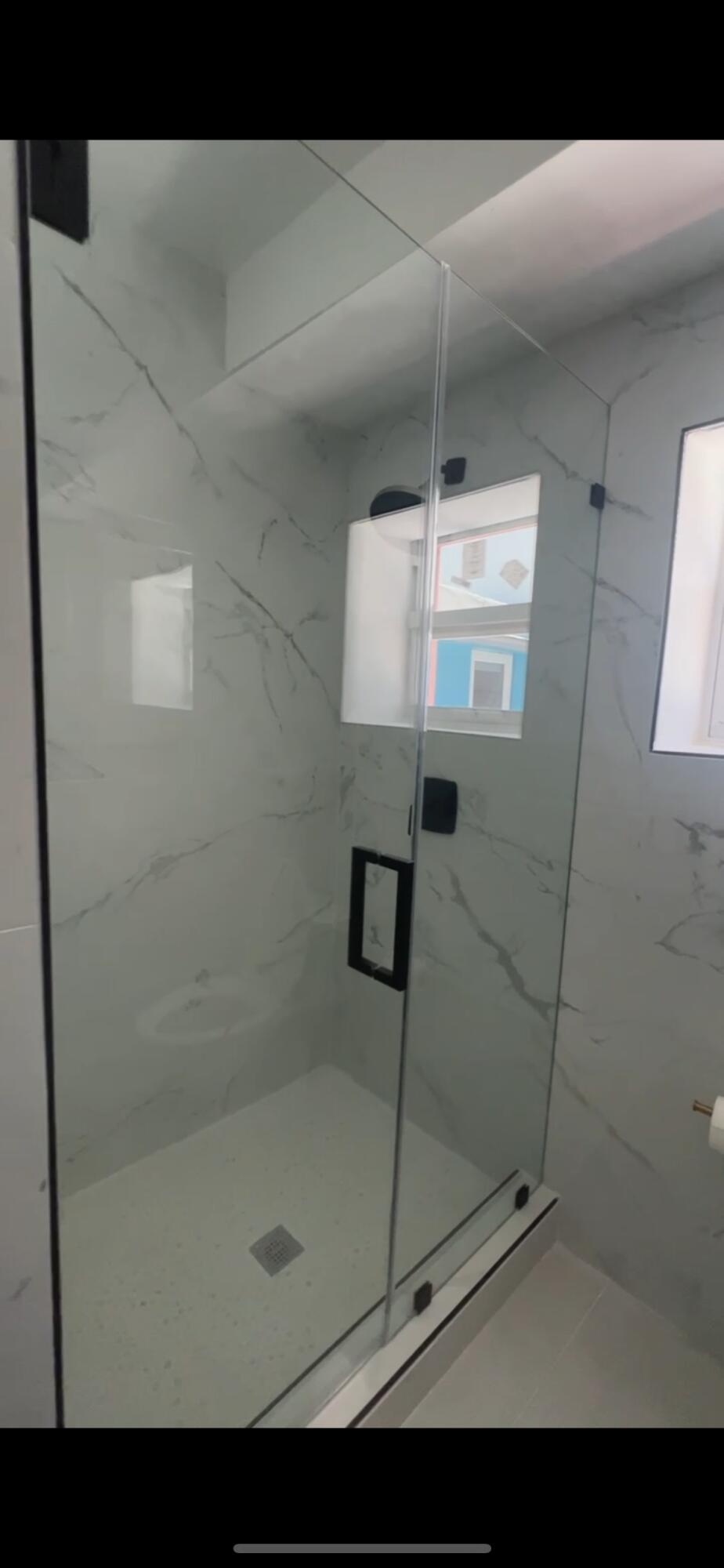 91865 Overseas Highway, Unit 110 Tavernier, FL 33070 - Photo 3 of 7 a bathroom with a shower