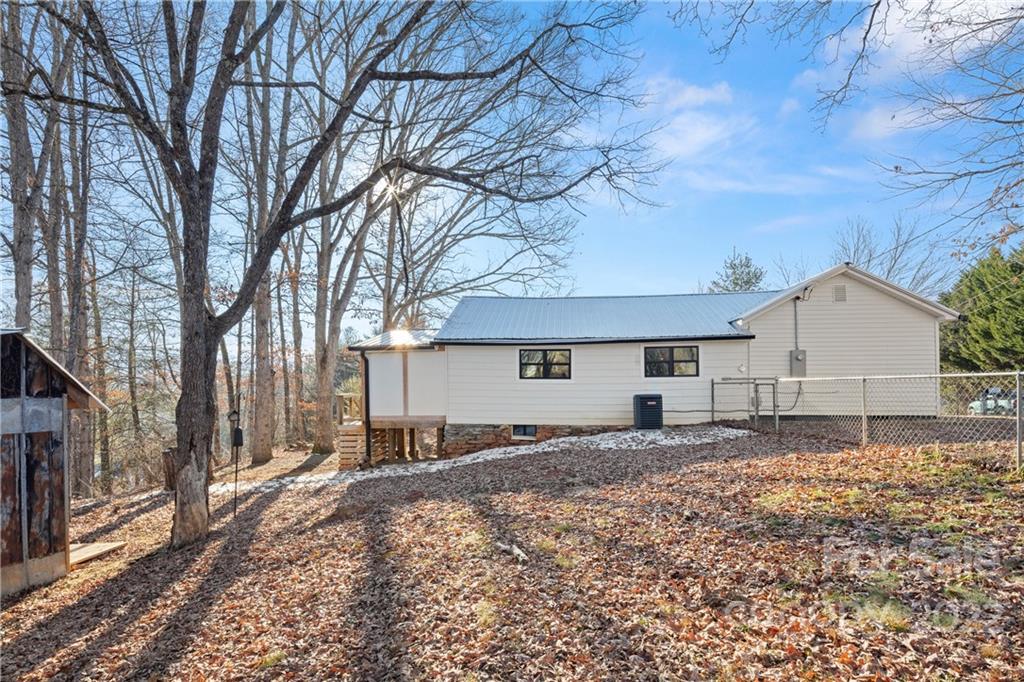 20 Indian Camp Branch Road Weaverville, NC 28787 - Photo 17 of 18 a backyard of a house