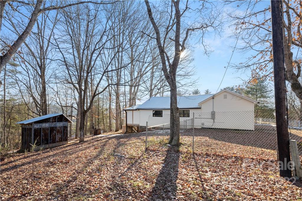20 Indian Camp Branch Road Weaverville, NC 28787 - Photo 18 of 18 a house with a large tree in front of it