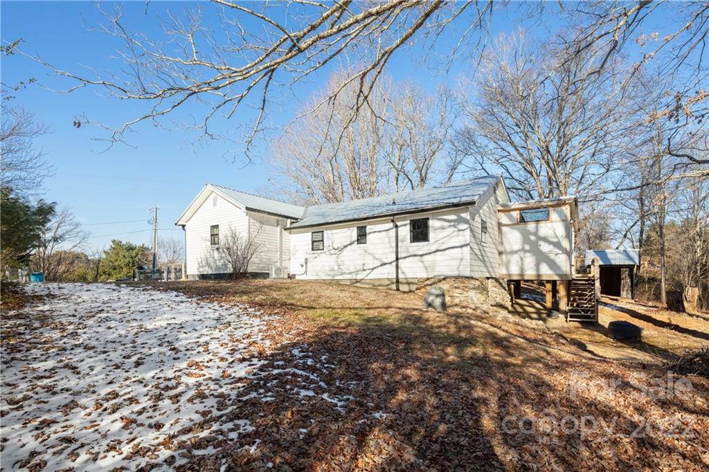 20 Indian Camp Branch Road Weaverville, NC 28787 - Photo 4 of 18 a view of a house with a yard