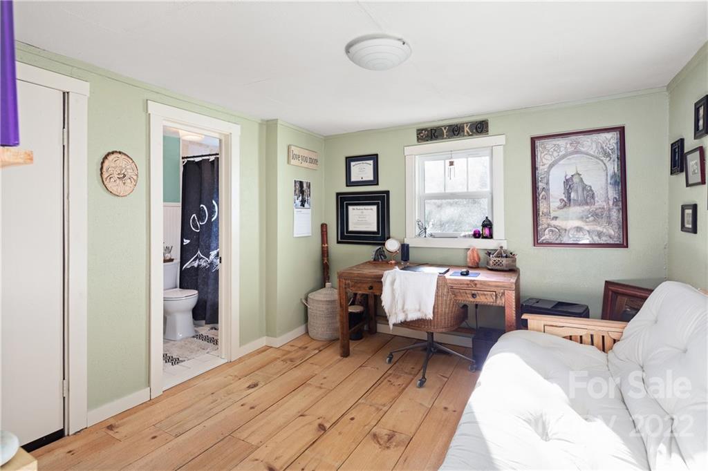 20 Indian Camp Branch Road Weaverville, NC 28787 - Photo 10 of 18 a bedroom with bed and furniture