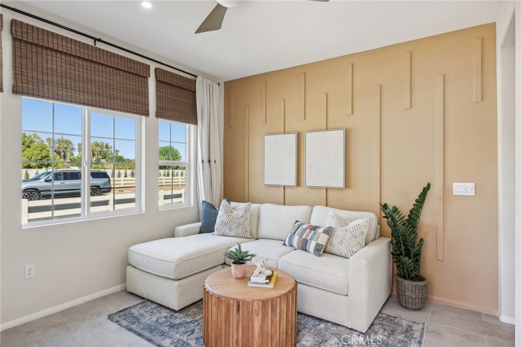 83239 Pintail Lane Indio, CA 92201 - Photo 16 of 45 a living room with furniture and a large window