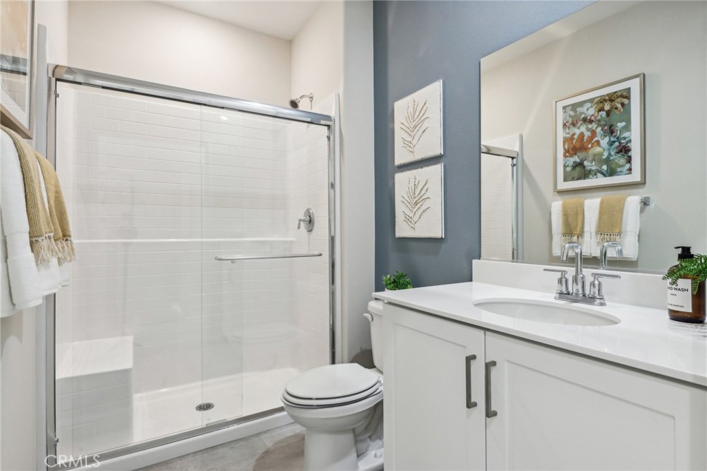 83239 Pintail Lane Indio, CA 92201 - Photo 19 of 45 a bathroom with a sink toilet and shower