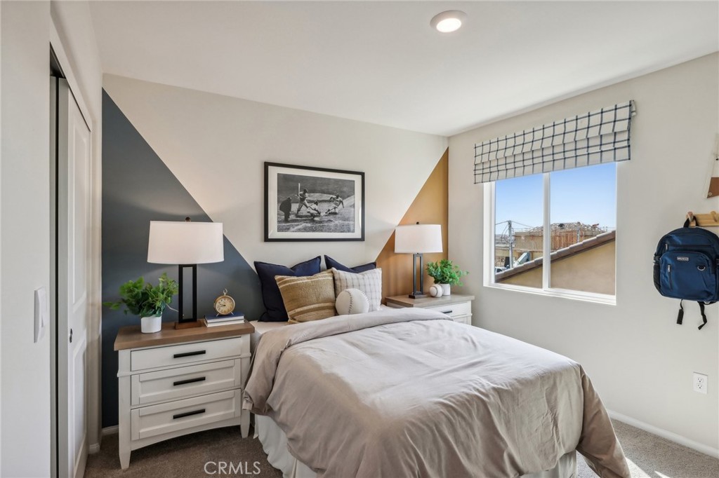 83239 Pintail Lane Indio, CA 92201 - Photo 33 of 45 a bedroom with a bed and a window