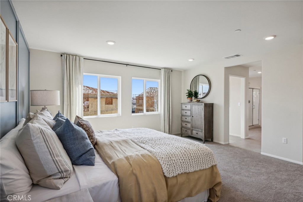 83239 Pintail Lane Indio, CA 92201 - Photo 36 of 45 a bed room with a bed mirror and window