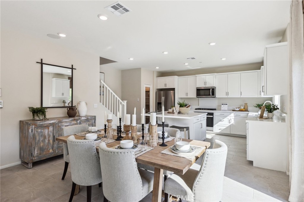 83239 Pintail Lane Indio, CA 92201 - Photo 8 of 45 a view of a dining room with furniture